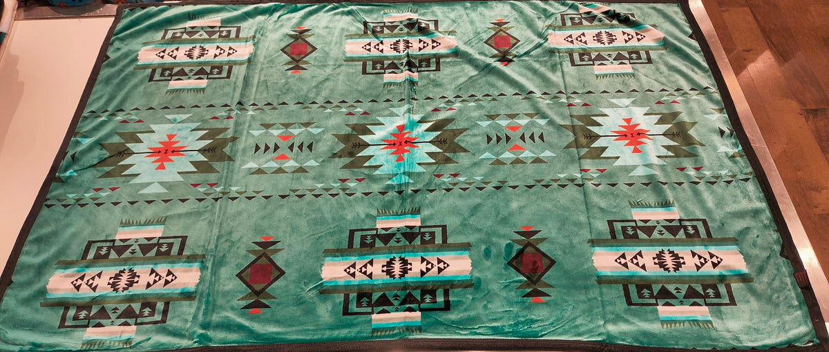 Teal / Turquoise original Converging Arrows blanket pattern reference for King, approximately 108 × 90 inches; photographed sample shows color and design.